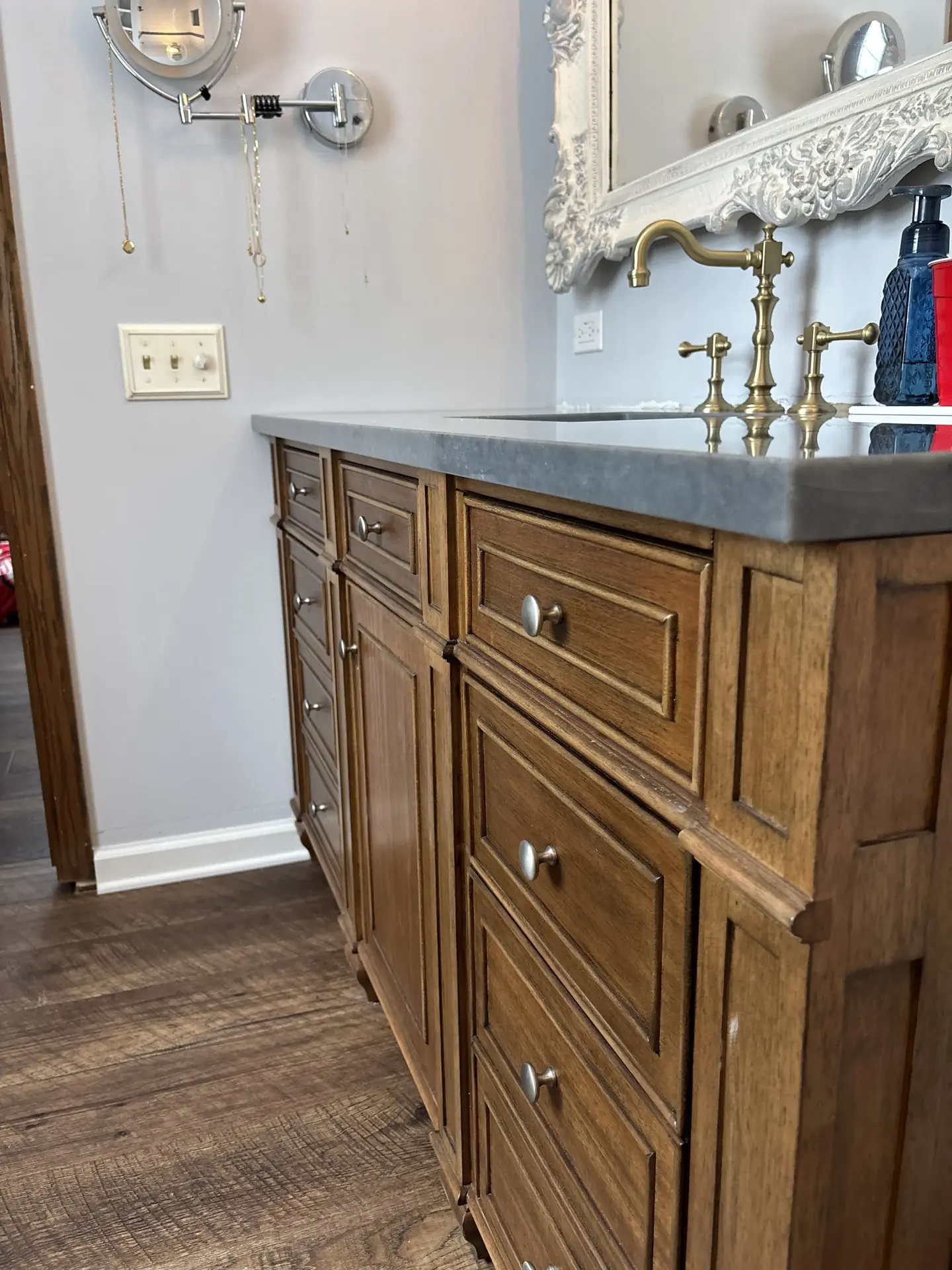 Vanity with satin brass faucet